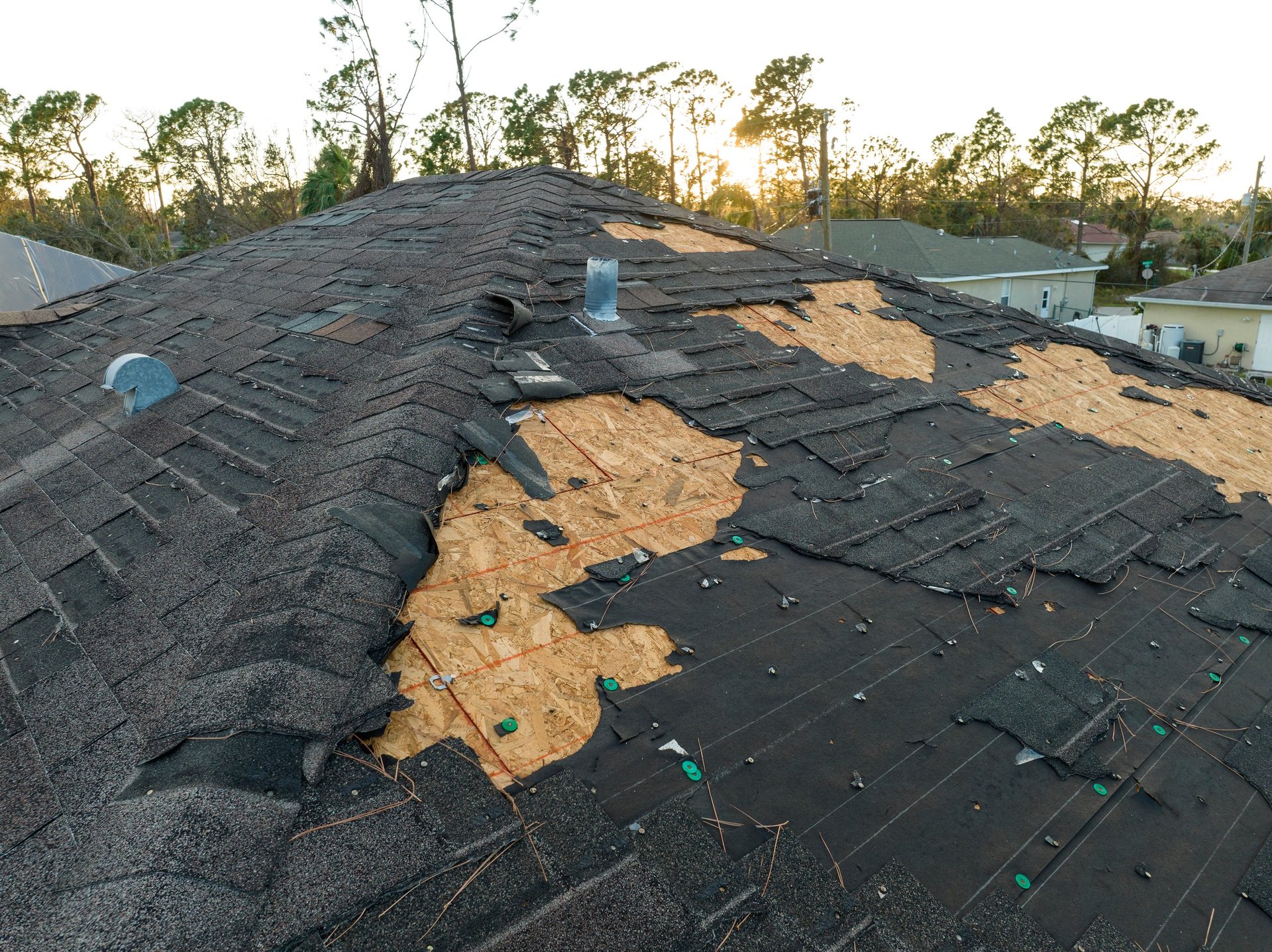 Storm damage on house roof