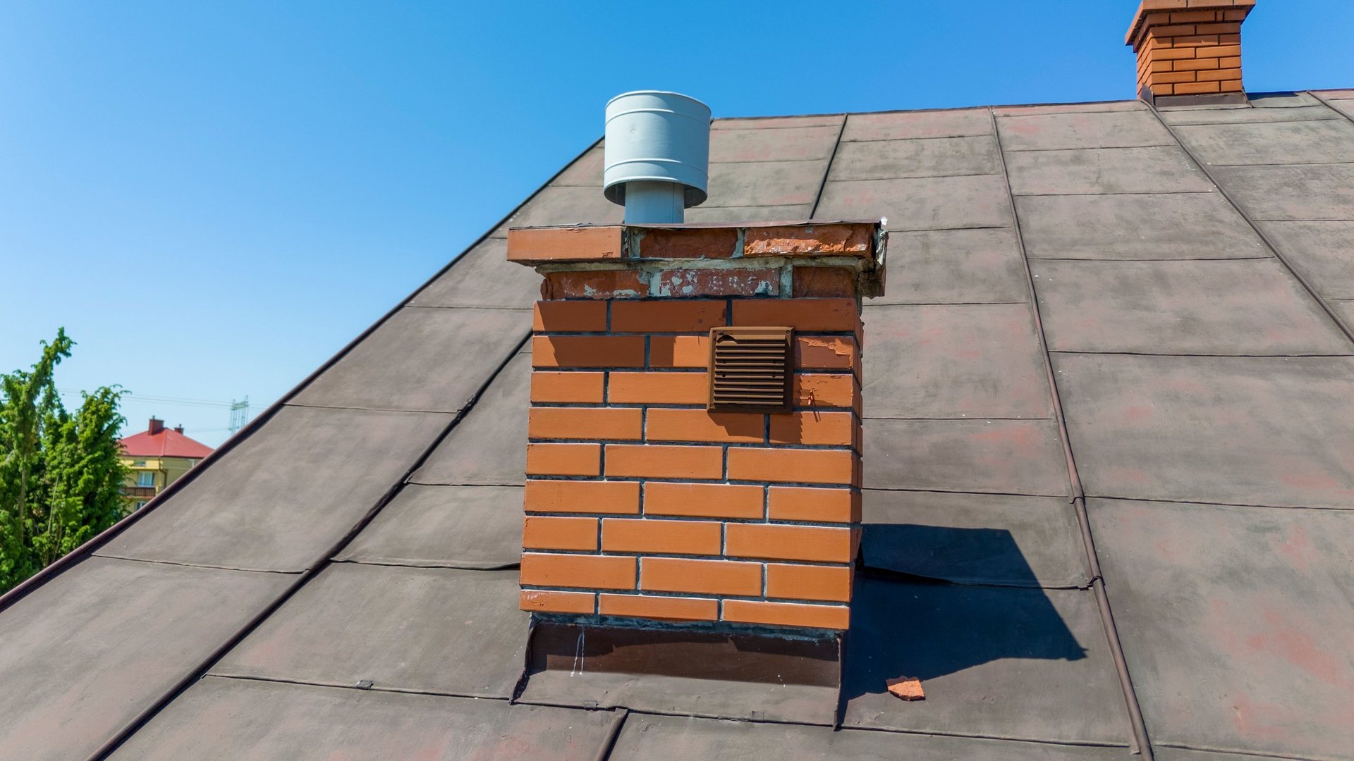 Brick chimney on roof